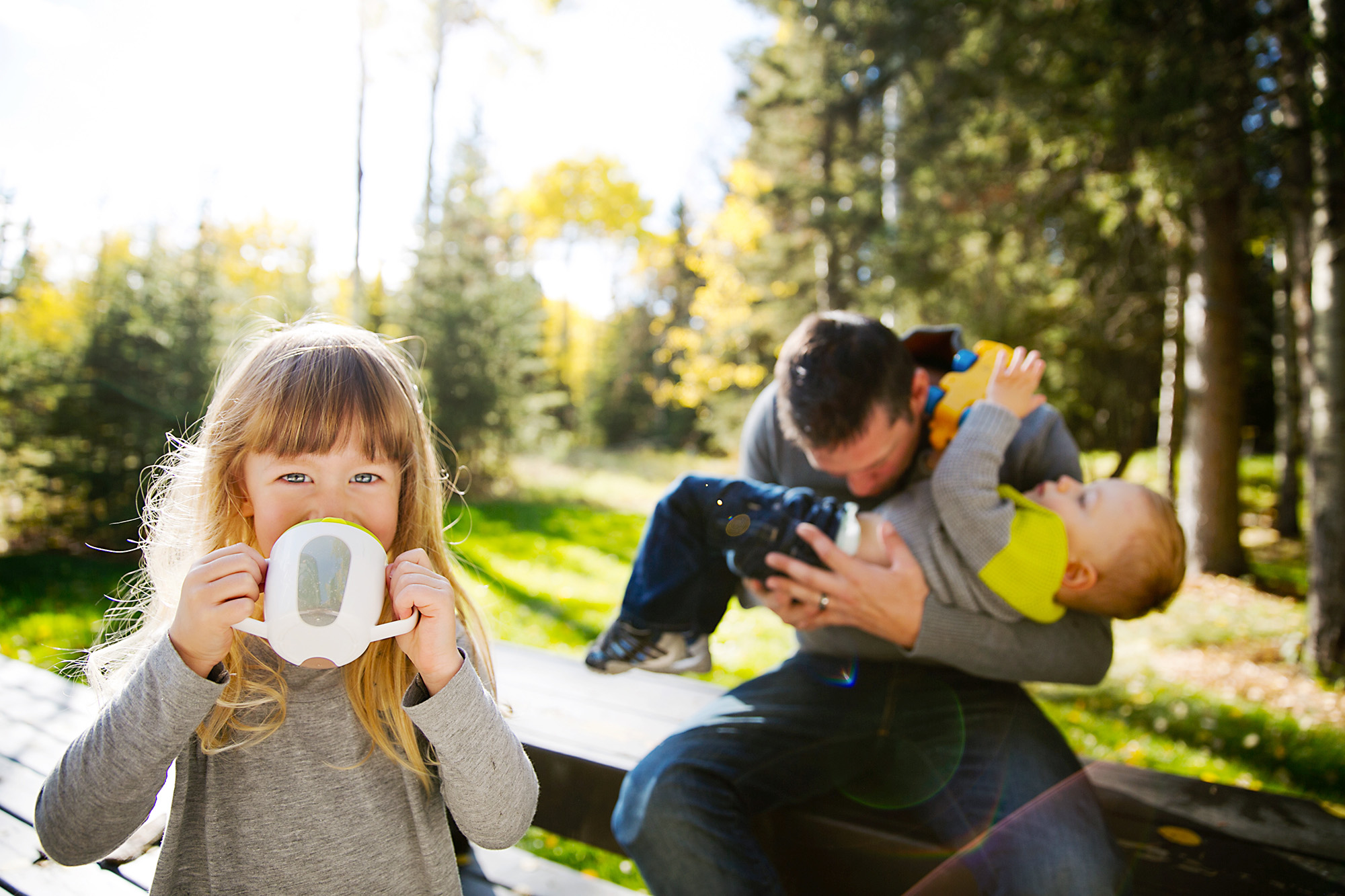 Family enjoying tea in the backyard
