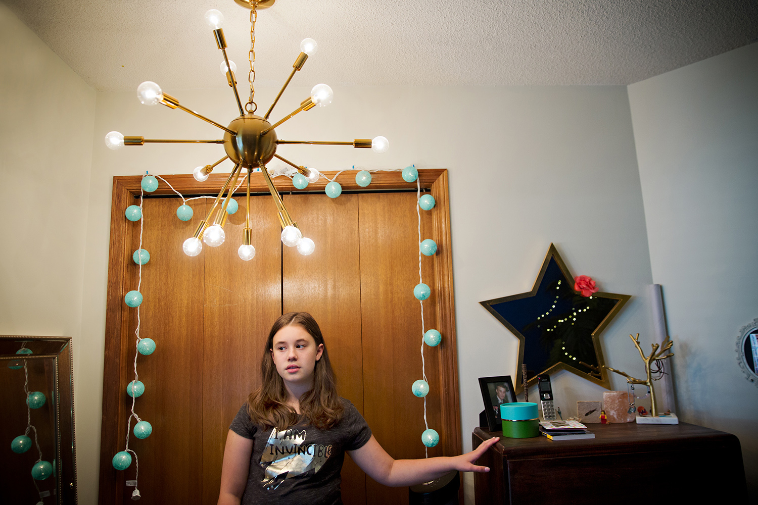 Editorial portrait of a tween in her room