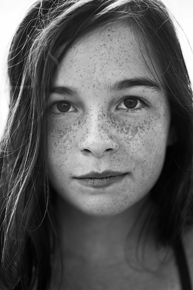 Tween portrait of a girl with freckles