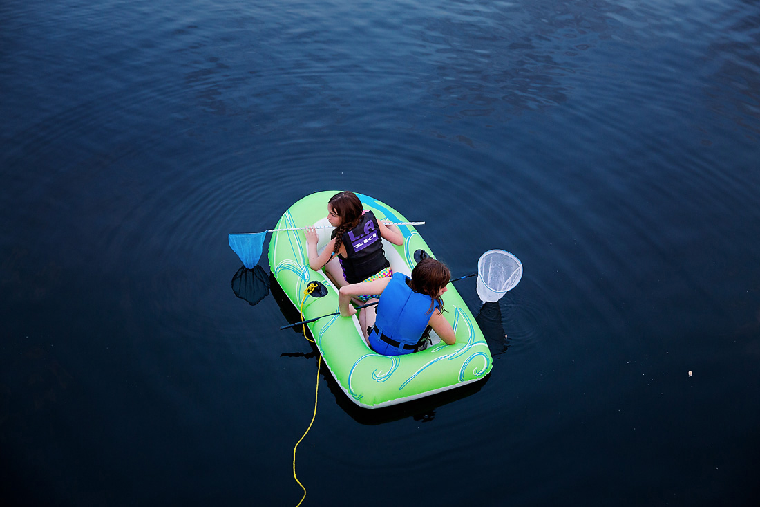 Sisters floating in a raft